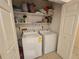 Convenient laundry room with modern washer and dryer set for easy chore management at 6305 Bikini Rd, Sarasota, FL 34241