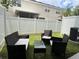 Well-maintained backyard featuring stylish patio furniture set perfect for relaxing at 6358 Fairmont Ln, Palmetto, FL 34221