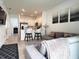 An open living area shows the kitchen, bar seating and Gathering room at 6358 Fairmont Ln, Palmetto, FL 34221