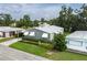 Aerial view of the house, showcasing its community and manicured landscaping at 6710 36 E Ave # 114, Palmetto, FL 34221