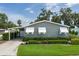 Charming single-story home with covered parking, awning-covered windows, and well-maintained landscaping at 6710 36 E Ave # 114, Palmetto, FL 34221