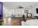 Bright and airy living room with hardwood floors, a white sofa, and unique decor elements at 6710 36 E Ave # 114, Palmetto, FL 34221
