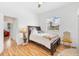 Bedroom with a queen bed and natural light at 7133 Dornough Ln, Bradenton, FL 34202
