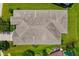 Aerial view of the roof and backyard showcases the property's well-maintained landscaping at 773 Rosemary Cir, Bradenton, FL 34212