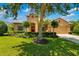 Charming single-story home with a manicured lawn and well-maintained landscaping at 773 Rosemary Cir, Bradenton, FL 34212