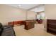 This game room features a foosball table, a relaxing seating area, and a dedicated desk space at 773 Rosemary Cir, Bradenton, FL 34212