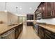 Spacious kitchen featuring granite counters, tile floors, and stainless steel appliances at 773 Rosemary Cir, Bradenton, FL 34212
