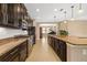 Gourmet kitchen featuring granite counters, tile floors, and stainless steel appliances at 773 Rosemary Cir, Bradenton, FL 34212