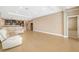 Expansive living room featuring tile floors and a partial view of the kitchen at 773 Rosemary Cir, Bradenton, FL 34212