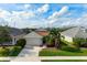 Charming single-story home with a well-maintained front yard and two car garage at 7750 Ridgelake Cir, Bradenton, FL 34203