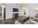 Comfortable living room with a cozy fireplace, modern furniture, and neutral color palette at 7750 Ridgelake Cir, Bradenton, FL 34203
