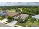 Beautiful home with a well-manicured front yard and a three car attached garage at 9236 Raes Creek Pl, Palmetto, FL 34221