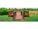 Backyard featuring wooden deck in a backyard setting at 1299 Tripoli, North Port, FL 34286