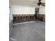 A large living room awaits renovation and finishing, showing interior framing at 13434 1St St E, Madeira Beach, FL 33708