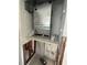 A utility room featuring a new HVAC unit and ready for your personal touch at 13434 1St St E, Madeira Beach, FL 33708