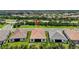 Lovely aerial view of a home surrounded by mature trees and landscaping, offering a private setting at 13513 Deep Blue Pl, Bradenton, FL 34211