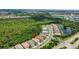 Scenic aerial shot of the property showcasing its proximity to a nature preserve and serene neighborhood at 13513 Deep Blue Pl, Bradenton, FL 34211