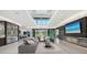 Elegant living room with a contemporary fireplace, plush seating, and a bright, open layout at 1610 N Lodge Dr, Sarasota, FL 34239