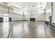 Spacious indoor basketball court featuring clean lines, natural lighting, and ample space for recreational games at 16231 Tradewind Ter, Bradenton, FL 34211
