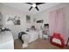 Bedroom with a ceiling fan and decorative items; perfect for personalization and relaxation at 16231 Tradewind Ter, Bradenton, FL 34211