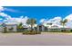 Elegant community clubhouse with manicured landscaping and a welcoming entrance, perfect for events and gatherings at 16231 Tradewind Ter, Bradenton, FL 34211