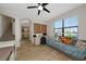 Spacious living room with comfortable seating, natural light, and modern decor at 16231 Tradewind Ter, Bradenton, FL 34211