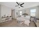 Spacious main bedroom with neutral decor, ceiling fan, and lots of natural light at 16231 Tradewind Ter, Bradenton, FL 34211