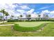 Manicured putting green in the community, perfect for golf enthusiasts to practice their short game at 16231 Tradewind Ter, Bradenton, FL 34211