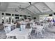 Airy restaurant features an open floor plan and elegant furniture, ideal for community gatherings and meals at 16231 Tradewind Ter, Bradenton, FL 34211