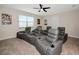 This home features a theater room with comfortable seating and movie posters at 16231 Tradewind Ter, Bradenton, FL 34211