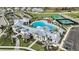A beautiful community clubhouse with a pool, playground, tennis courts, and ample parking at 17134 Savory Mist Cir, Bradenton, FL 34211