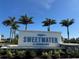 Sweetwater at Lakewood Ranch community sign with palm trees on a sunny day at 17134 Savory Mist Cir, Bradenton, FL 34211