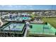 Recreation area with tennis and basketball courts, playground, and pool creating an active community lifestyle at 17134 Savory Mist Cir, Bradenton, FL 34211