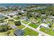 An aerial view shows the property's location and proximity to local amenities at 2026 Arkansas Ave, Englewood, FL 34224