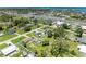 Overhead shot of a house and neighborhood with views of a waterway at 2026 Arkansas Ave, Englewood, FL 34224