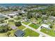 This aerial view showcases the prime location and the tranquil neighborhood, close to local amenities and natural beauty at 2026 Arkansas Ave, Englewood, FL 34224