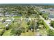 Real estate aerial view of a property showing surrounding neighborhood and landscape at 2026 Arkansas Ave, Englewood, FL 34224