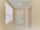 Bright entryway features neutral paint and tile flooring at 2026 Arkansas Ave, Englewood, FL 34224