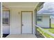 A close up of the front door showcasing its design at 2026 Arkansas Ave, Englewood, FL 34224