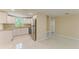Newly renovated kitchen with stainless appliances and white cabinets at 2026 Arkansas Ave, Englewood, FL 34224