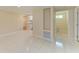 Spacious living area with tile flooring and natural light at 2026 Arkansas Ave, Englewood, FL 34224