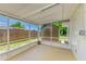 Screened porch featuring privacy screening and shed at 2026 Arkansas Ave, Englewood, FL 34224