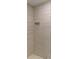 Modern shower with stylish tile and convenient built-in niche for toiletries at 2026 Arkansas Ave, Englewood, FL 34224