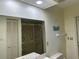 Bright bathroom features a walk-in shower, storage closet, and Beach-themed decor at 22321 Yonkers Ave, Port Charlotte, FL 33952