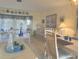 Living room featuring a sofa, coffee table, and dining table with seating at 22321 Yonkers Ave, Port Charlotte, FL 33952