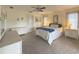 Comfortable main bedroom with neutral walls, neutral carpeting, and large dressers at 22321 Yonkers Ave, Port Charlotte, FL 33952