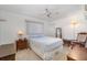 Bright bedroom with neutral tones, soft carpet, and classic furnishings at 22434 Walton Ave, Port Charlotte, FL 33952