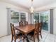 Dining area with a view of the patio and pool area at 22434 Walton Ave, Port Charlotte, FL 33952