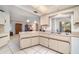 Open-concept kitchen featuring ample countertop space and modern stainless-steel appliances at 22434 Walton Ave, Port Charlotte, FL 33952