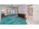 Bright living room adjacent to the kitchen with tile floors at 22434 Walton Ave, Port Charlotte, FL 33952